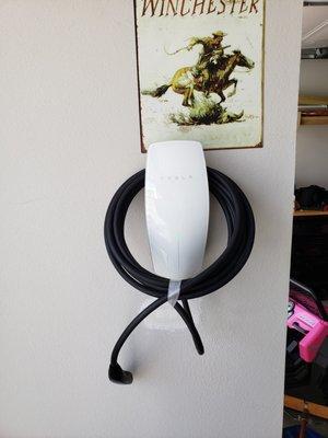 Tesla Wall Connector installed with 6 AWG wire and a 60 amp breaker to maximize charging efficiency