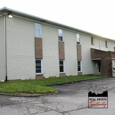 Alternate entrances to 2246 S. Hamilton Road commercial office building. One home of Real Estate Opportunity--focus: property management.