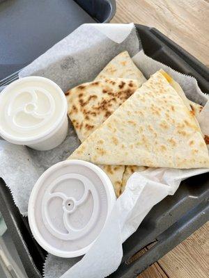 Chicken quesadilla (to go) with side of salsa and sour cream