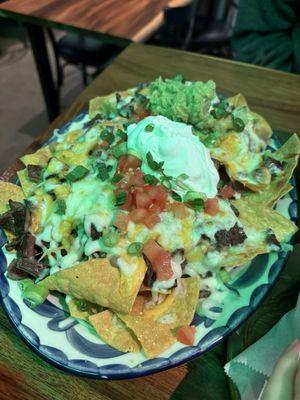 Super nachos with carne asada