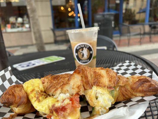 Ice oat coffee and veggie omelette in a croissant. Perfection!!