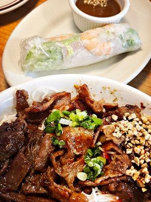 Pork vermicelli bowl with a spring roll