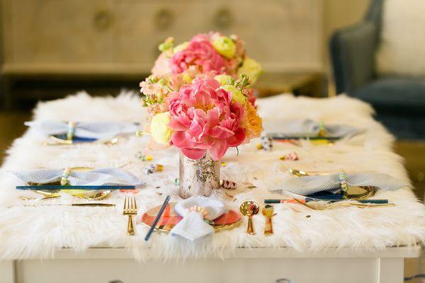 Add kids- Ready, Set , Go ! It's a party complete with a baby alpaca, colorful tablescape, beautiful florals and treats for all.