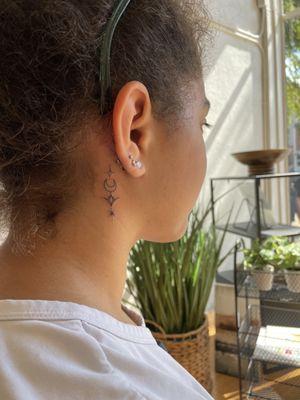 Tiny ornament tattoo