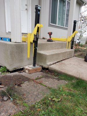 This photo shows how the Gooden-Harrison front porch sank, tilted and cracked. They refused to correct or pay for the cost to repair it.