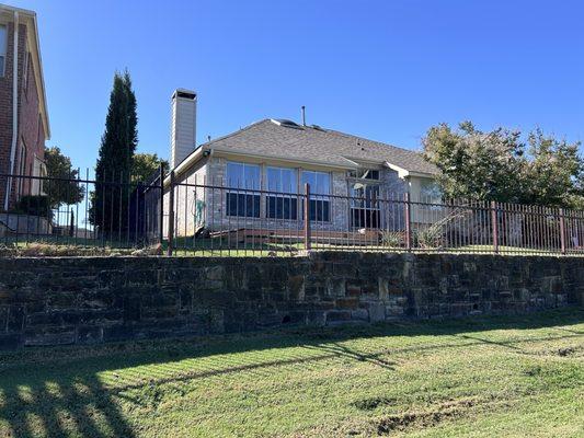 4' tall metal fence with 8' paneling's made from 1 inch and half inch square tubing.