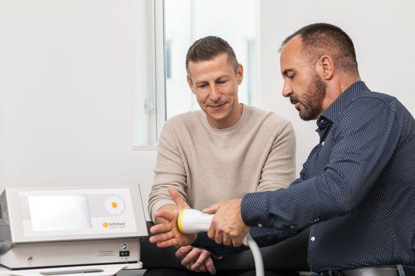 Relief starts here; non-invasive SoftWave therapy in action.