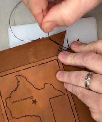 The leather valet tray project requires punching stitching holes and sewing.