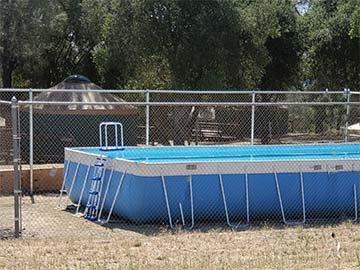 The NEW POOL is installed, filled with cool water and great for these hot summer days.
