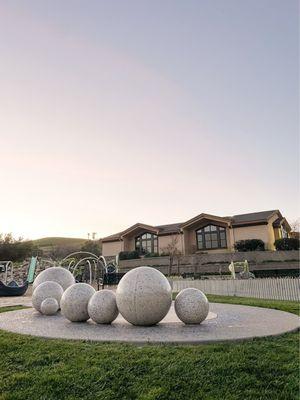 My kids are always trying to balance on these architectural balls.