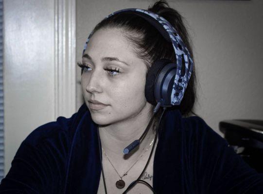A pair of our wired PS4 headphones. Modeled by Danielle S.