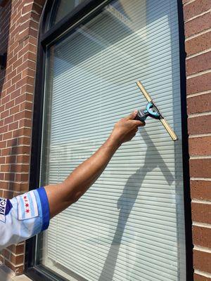 Window Cleaning with a squeegee.