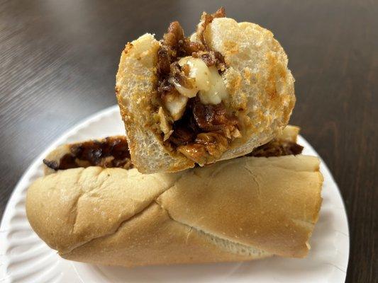 Bbq Chicken Sandwich - BBQ chicken, bacon, pepper jack cheese and frazzled onions on a long roll. Comes with fries.