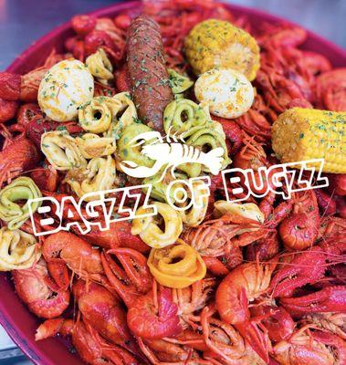 Crawfish, sausage, boiled egg, corn and tortellini