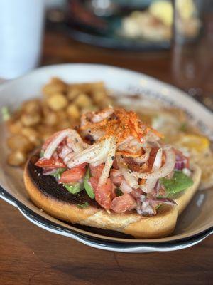 Avocado toast, side slightly burned, just scraped it off - no biggie