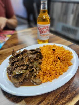 Herring rice and beef guisado