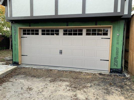 New install of 16 x 7 installed door with windows and hardware kit