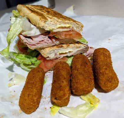 Cuban sandwich with croquetas