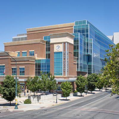 Photo of a large glass and brick building