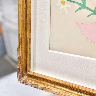 Enhanced art display: combining a textile-wrapped 8-ply window mat with glass spacers of the same color in a hand-carved 22 kt gilded frame.