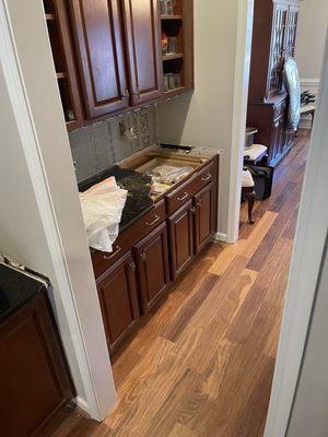 Dry bar area granite being removed.