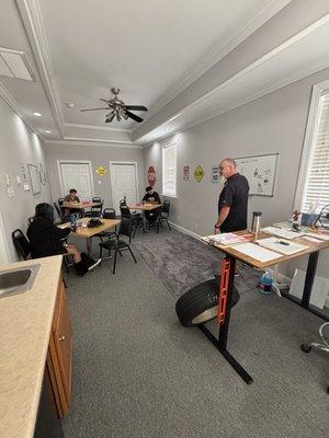 Inside Road Gnome Driving School: clean, comfortable, and filled with good energy (and a few gnomes for luck!). 