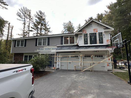 New room addition on top of a garage with a custom dormer and Andersen 400 series casement Windows 2023.