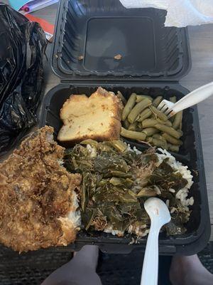 Fried pork chop with very little green a lot of rice