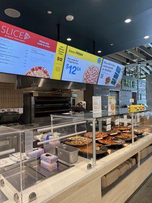 Pizzeria with Menu above