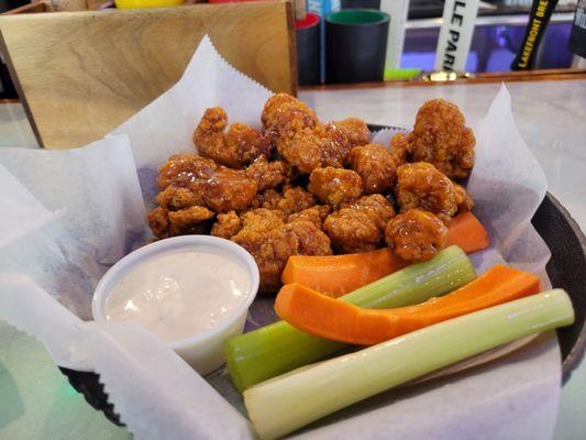 Boneless chicken wings. Great sauce, hot and fresh.