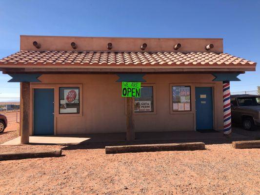 This is our shop. Use the North door to enter.