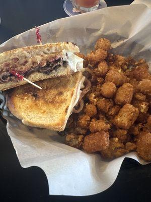 Roast Beef sandwich with cajan tots. Very goodn