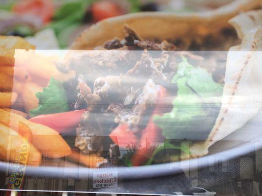 Gyro roll with pita and salad