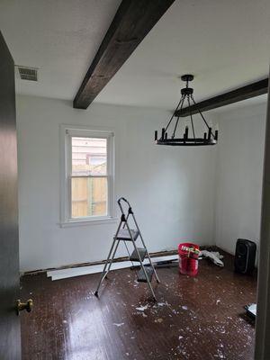 Installed faux beams per client request ..installed new light fixture