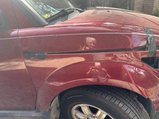 I peeled a piece of my car OFF (above), and Caliber Collision fixed it.