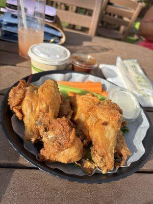 Plain wings (the only way I eat wings) the  sauce is on the side.