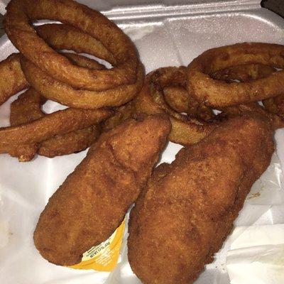 Chicken tenders that are in the shape of a pressed fish. Terrible taste. Onion rings tasted like fish.