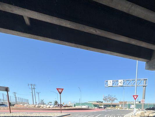 A well-designed roundabout nearby the fields to control traffic flow!