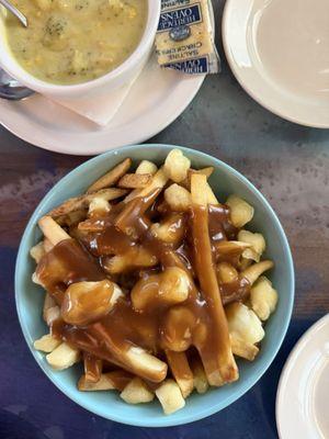 Poutine fries. Cheese curds, and fried potatoes with gravy. I'm not from Canada, but I really liked this!