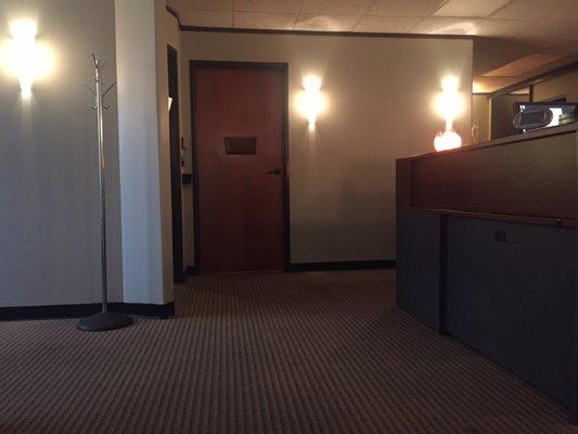 The office has dim lights and has a spa like feel