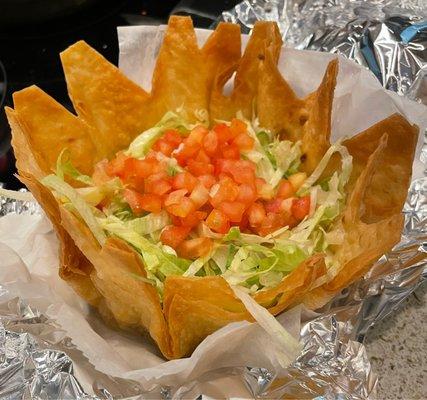 Beef taco salad. I asked for the sour cream and guacamole on the side.