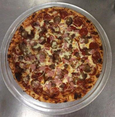 Meat Lovers Pizza With A Light Touch Of Onions And Peppers!