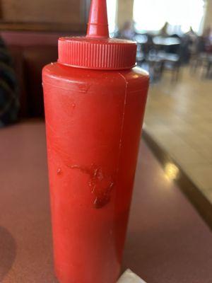 Dirty catsup bottle.