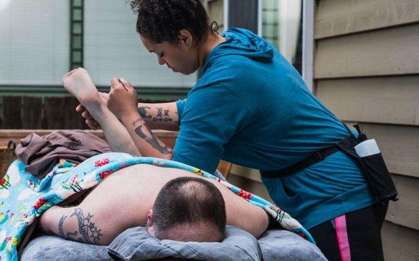 Deep pin and stretch of the hip, outdoor session with Mia's Mobile Massage :)