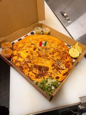 Pizza made with your choice of meat. (Picture pizza was made with our house barbacoa)