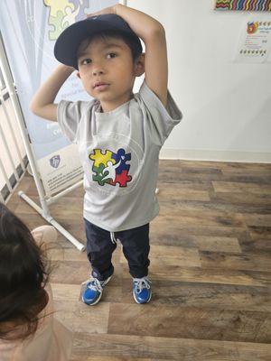 When you join they give your child their very own Excel Together shirt to wear to sessions.