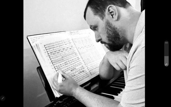 Mr. Mike studying Stravinsky