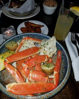 Garlic butter crab legs with corn and potatoes