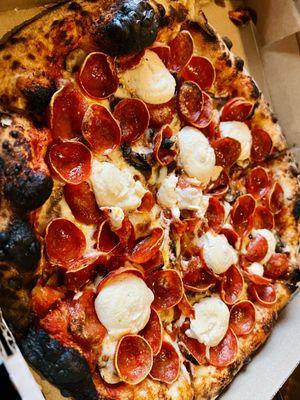 Pepperoni, mushrooms, & black truffle ricotta