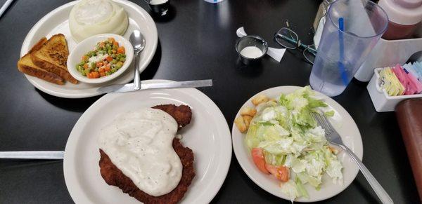 Chicken fried steak. Way over fried or dirty oil.